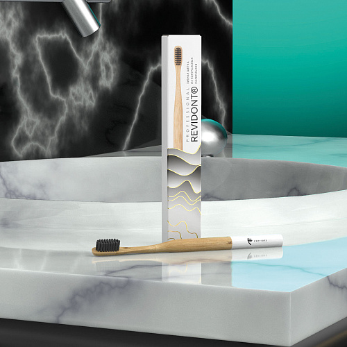 New — Revidont bamboo toothbrush
